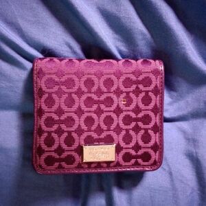 Coach bi-fold purple wallet